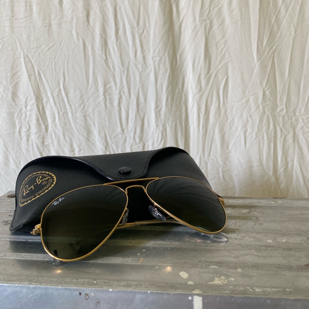 Used Aviator Sunglasses. Rarely worn. Like new.